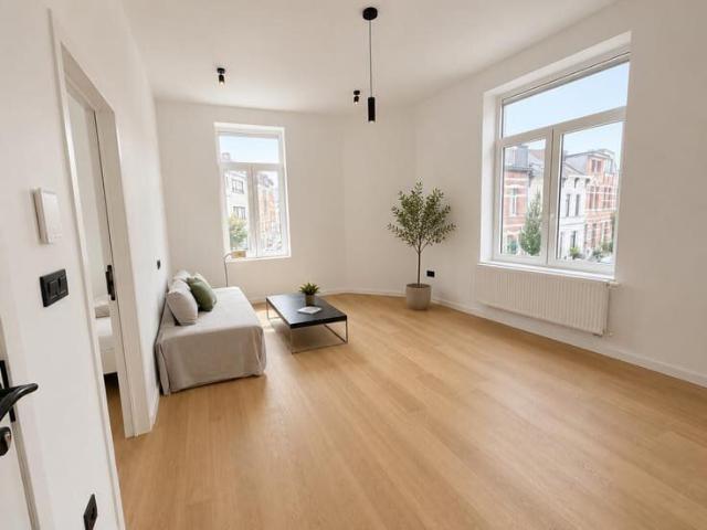 Lichtrijk hoekappartement in bruisend Oud Berchem