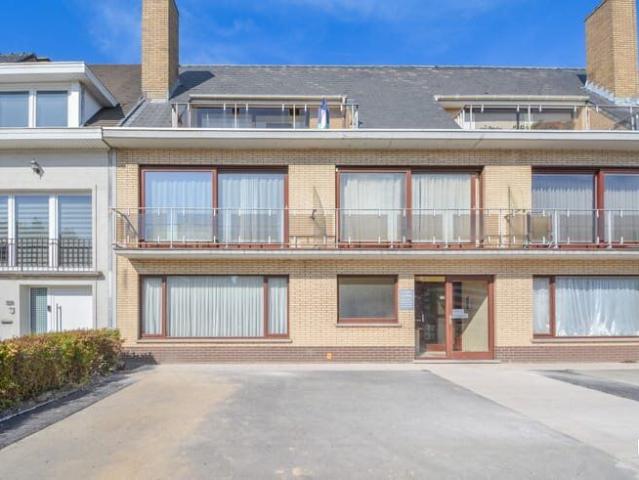 Lichtrijk tweeslaapkamer appartement met garage