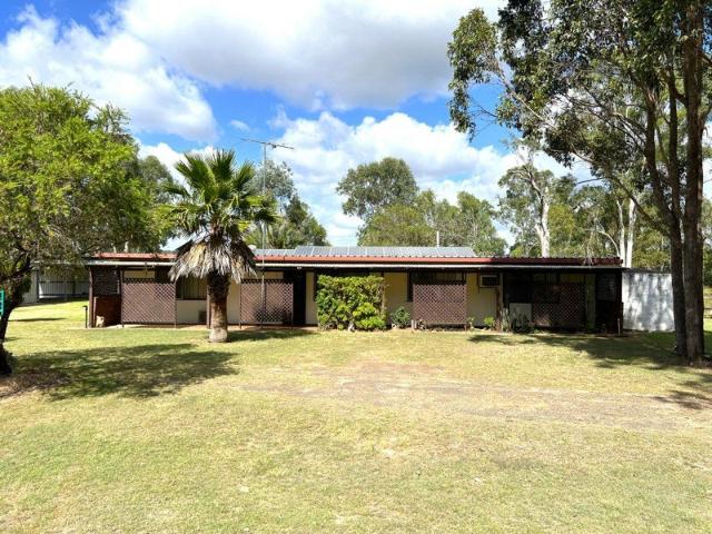 Lifestyle Acreage with Exceptional Shedding