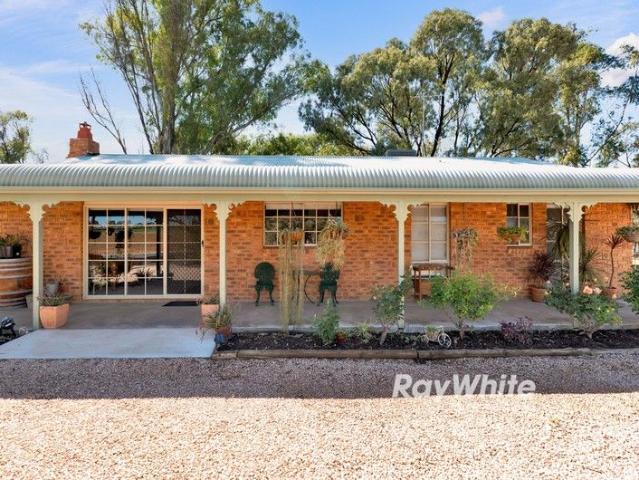 Lifestyle at its Finest 1.5 acres on the Edge of King's Billabong