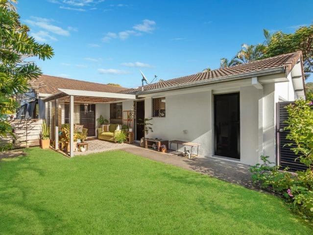 Lifestyle duplex with income potential, just a stroll to the beach
