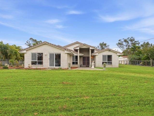 Lifestyle Opportunity on Expansive Acreage