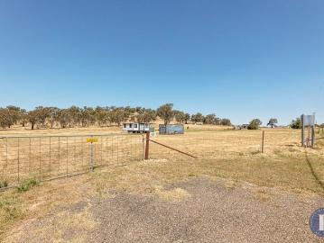 Lifestyle Opportunity with Tiny Home in a Peaceful Village Setting