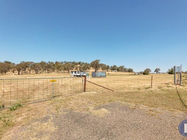 Lifestyle Opportunity with Tiny Home in a Peaceful Village Setting