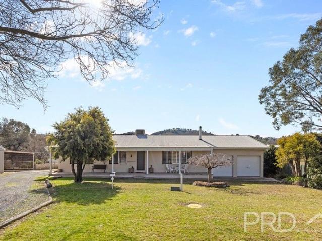 Lifestyle Opportunity with Creek Frontage!