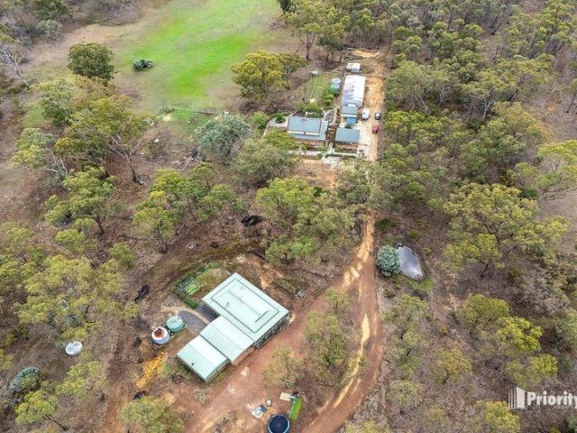 LIFESTYLE SPACE AND VERSATILITY ON 37 ACRES