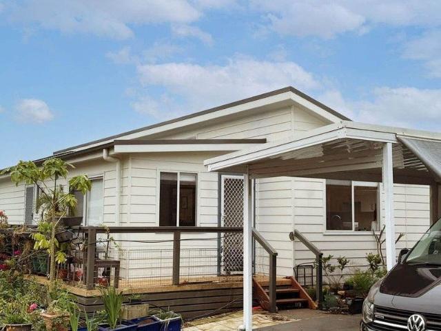 Modern Lakeside Living in a Quiet Cul de Sac 2 Beds, 2 Car, Solar, Pool $485K