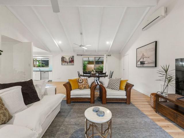 Light Filled Coastal Home in a Sought After Location