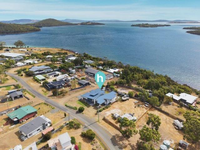 Luxury Waterfront Living, Incredible Sunsets & Airbnb Potential