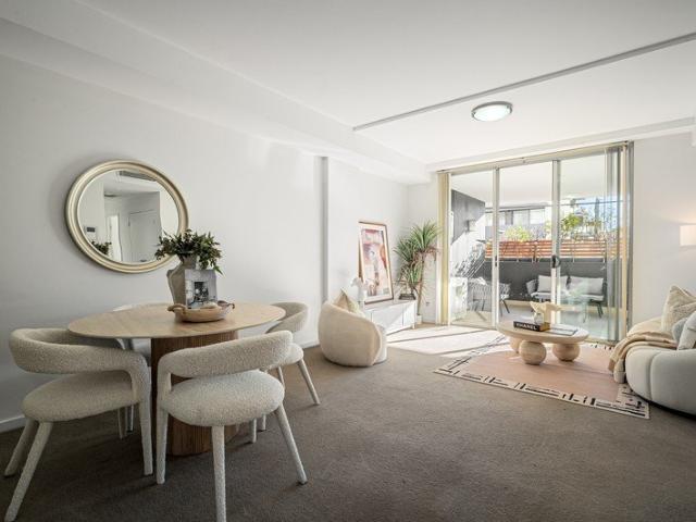 Light filled apartment living with rare two car convenience