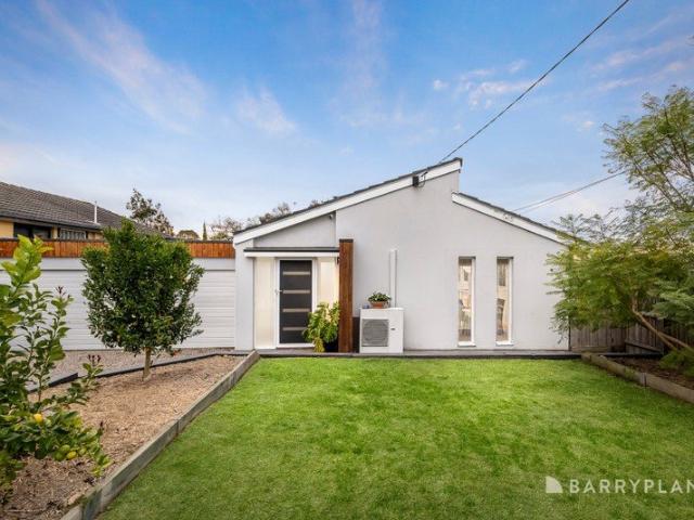 Light Filled Bayside Sanctuary: Where Soaring Ceilings Meet Fireside Warmth