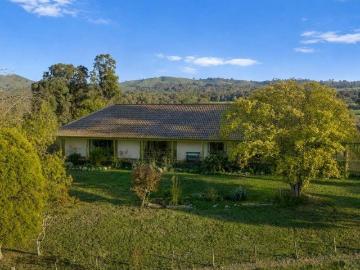 Light filled brick farmhouse with stunning views!