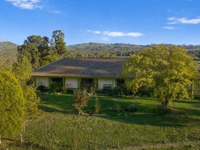 Light filled brick farmhouse with stunning views!