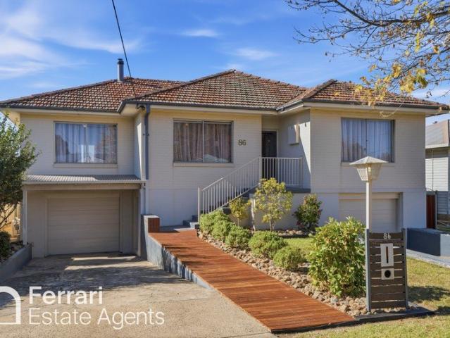 Light filled family home with two driveways, walk to schools and shops
