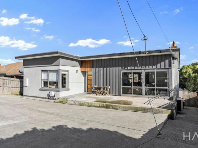 Light Filled Family Living in a Peaceful Youngtown Pocket