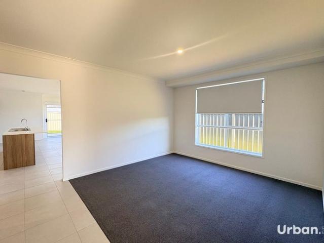 Light Filled Family Living in a Prime Greta Location with Solar Panels!