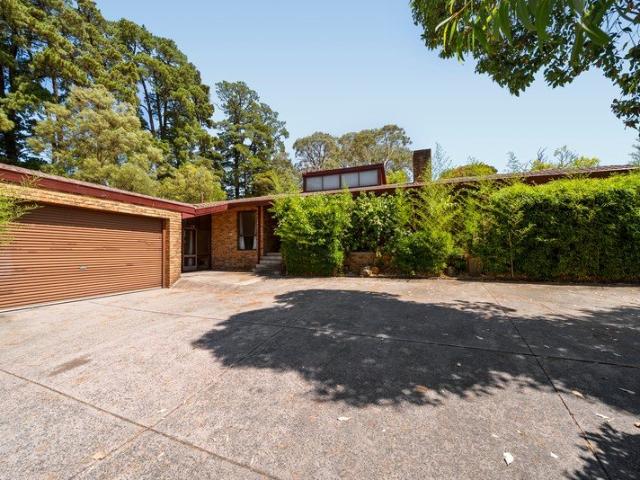 Light Filled Family Retreat with Multiple Living Areas & backyard maintenance included