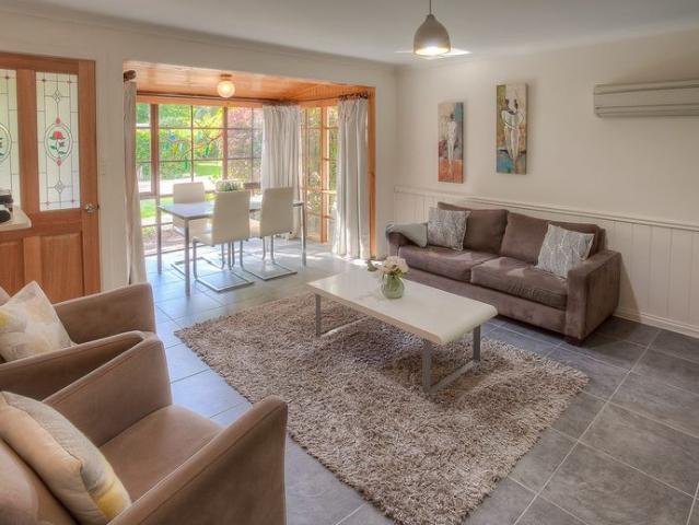 Light Filled Fully Furnished Unit just a short stroll to town 12 month lease