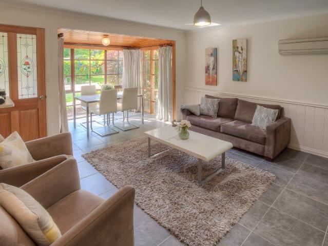 Light Filled Fully Furnished Unit just a short stroll to town 12 month lease