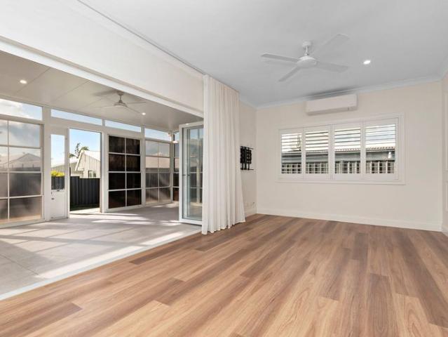LIGHT FILLED HOME WITH SUNROOM AND SECURE YARD