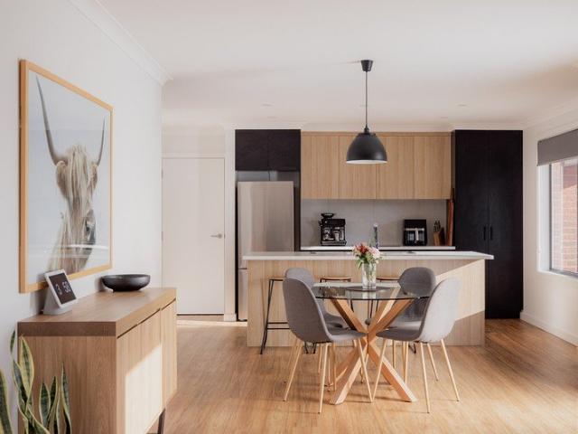 Light filled open plan living with a spacious, low maintenance yard and generous side access