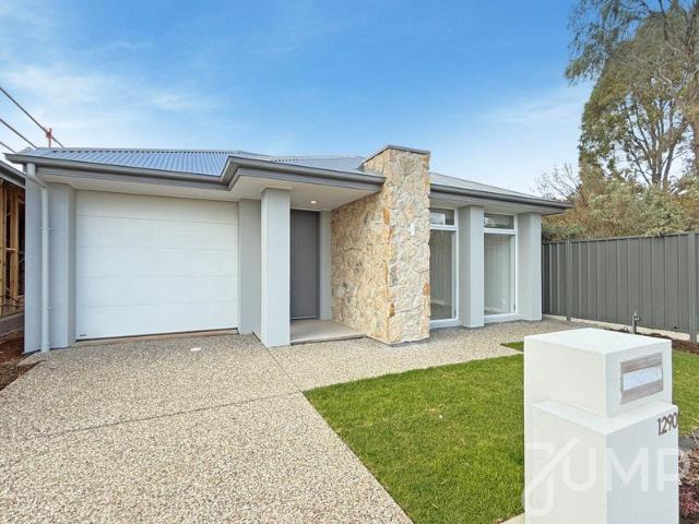 Light filled open plan living in quality build!