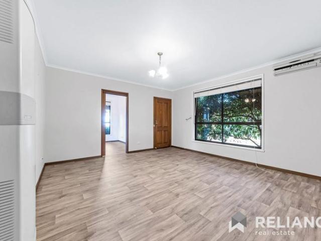 Light Filled, Low Maintenance, and Move In Ready