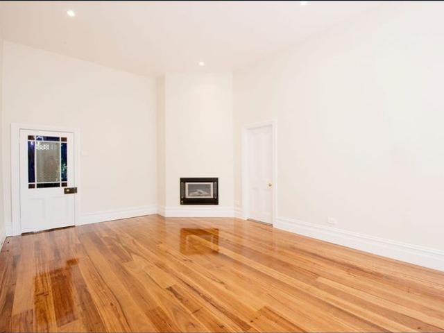 LIGHT FILLED LOW MAINTENANCE HOME IN SUPER CENTRAL LOCATION