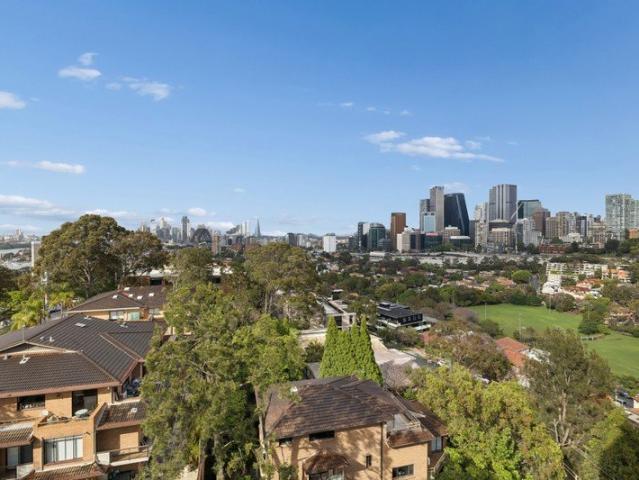 Light Filled Living Capturing Panoramic City and Harbour Views