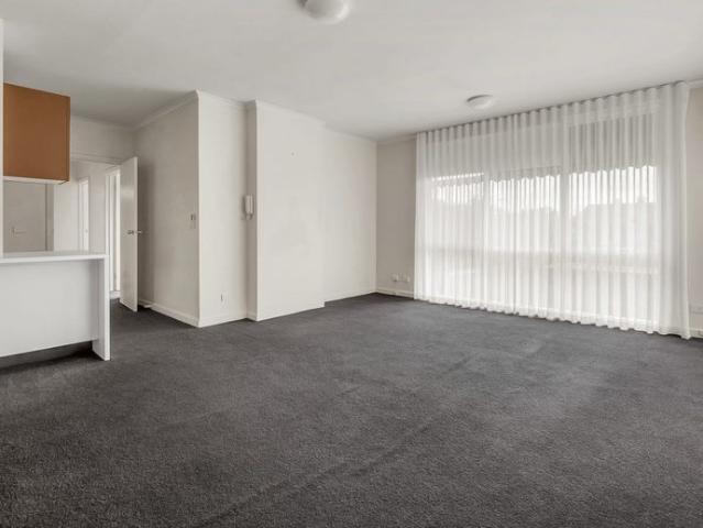 Light filled living in a quiet boutique block