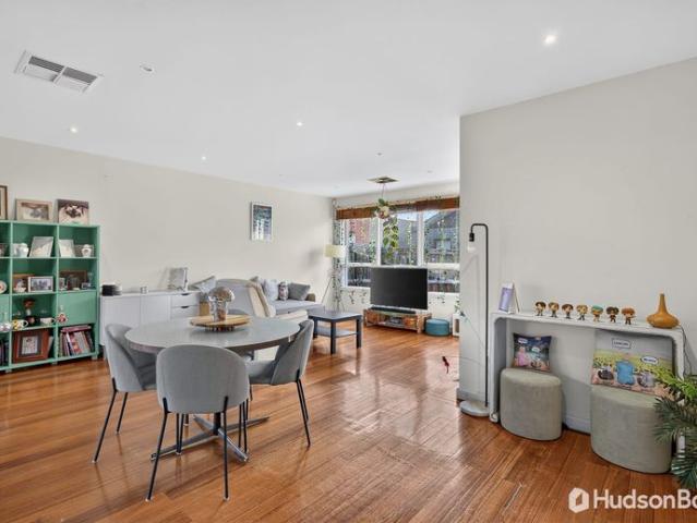 Light filled Living in Low Maintenance Setting