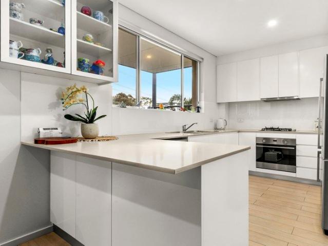 Light filled living in sought after location