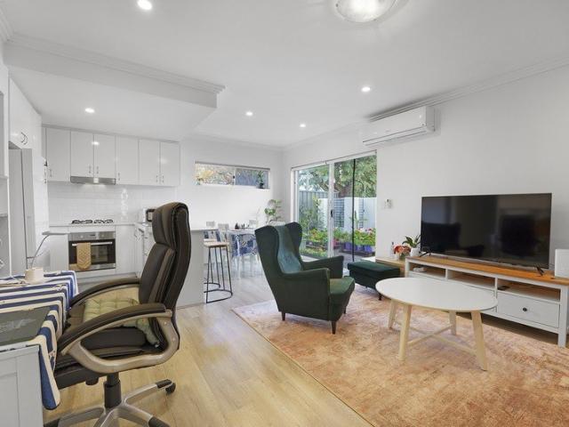 Light Filled Living Large Courtyard Hybrid Timber Flooring!