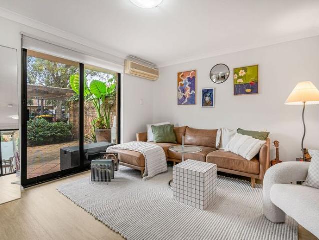 Light Filled Living with Courtyard Charm