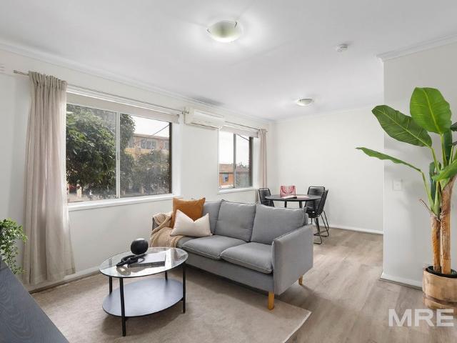 Light filled living with city views