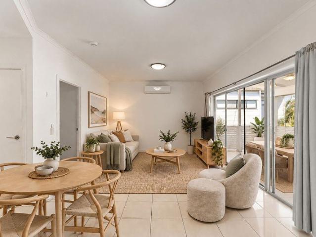 Light Filled Living with a Balcony Made for Entertaining