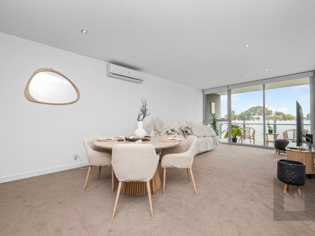 Light Filled Living with an Expansive Balcony