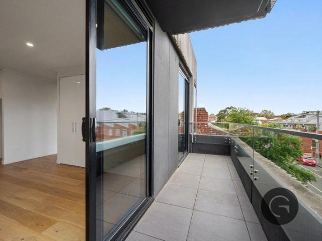 Light Filled Living With Balcony In 'Edinburgh Village'