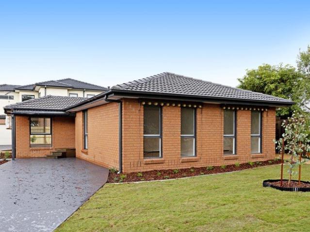 Light Filled Single Level Brick Home with Spacious Backyard
