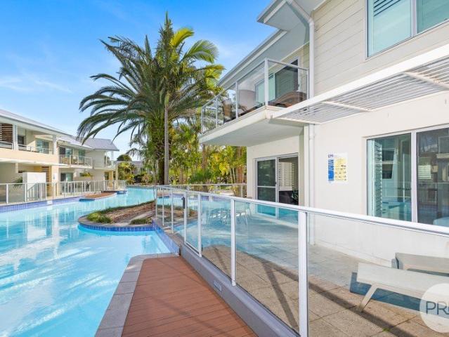 Light Filled Poolside Retreat in Prime Location
