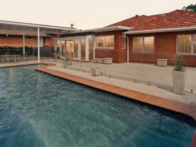 Light Filled Residence with Poolside Entertaining in a Prestigious Locale