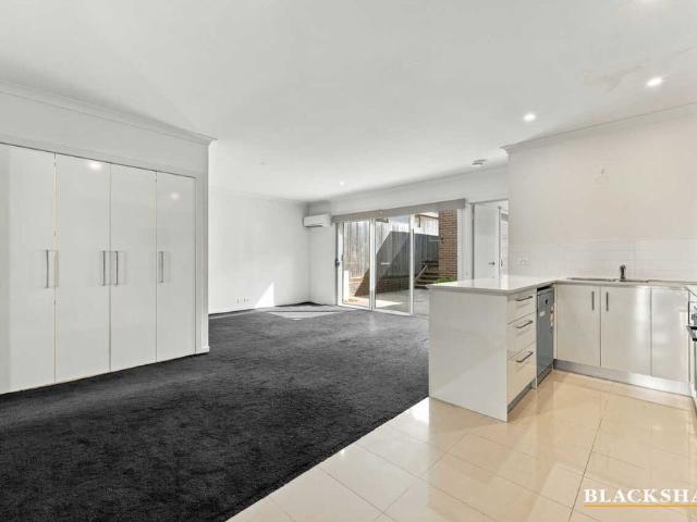 Light Filled Townhouse Offering Comfort & Convenience.