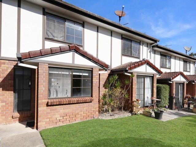 Light Filled Townhouse with Opportunity to Add Value