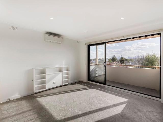Light Filled Top Floor Apartment with CBD Views in Hawthorn