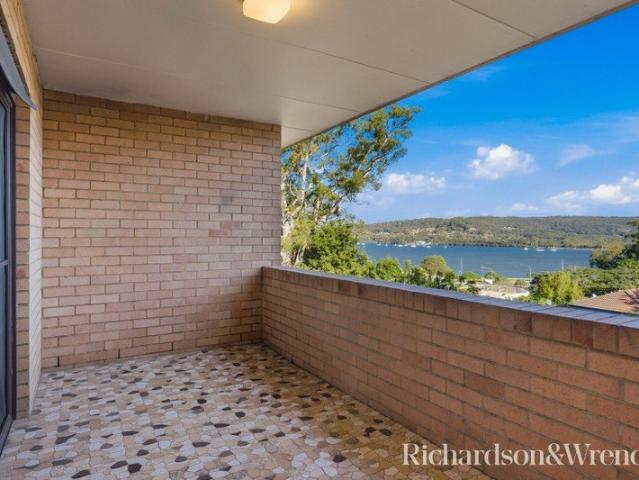Light Filled Top Floor Apartment with Stunning Water Views
