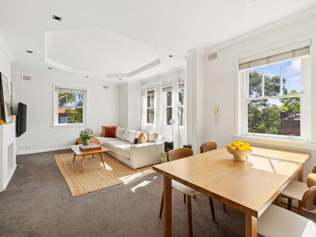 Light filled top floor apartment in revived Art Deco block of six