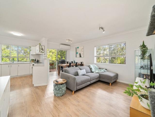 Light Filled Top Floor Living in a Quiet Complex