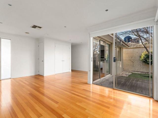 Light Filled Three Bedroom Home with Private Courtyard