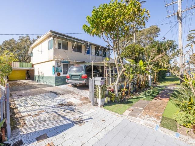 LIGHT FILLED TWO BEDROOM HOME WITH UTILITIES INCLUDED