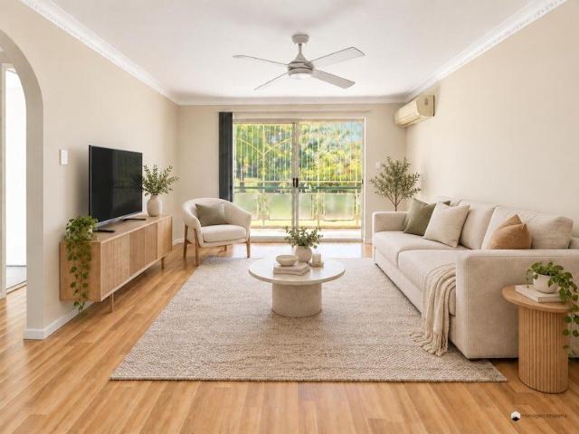 Light Filled Two Bedroom Unit with Dual Balconies & Air Conditioning